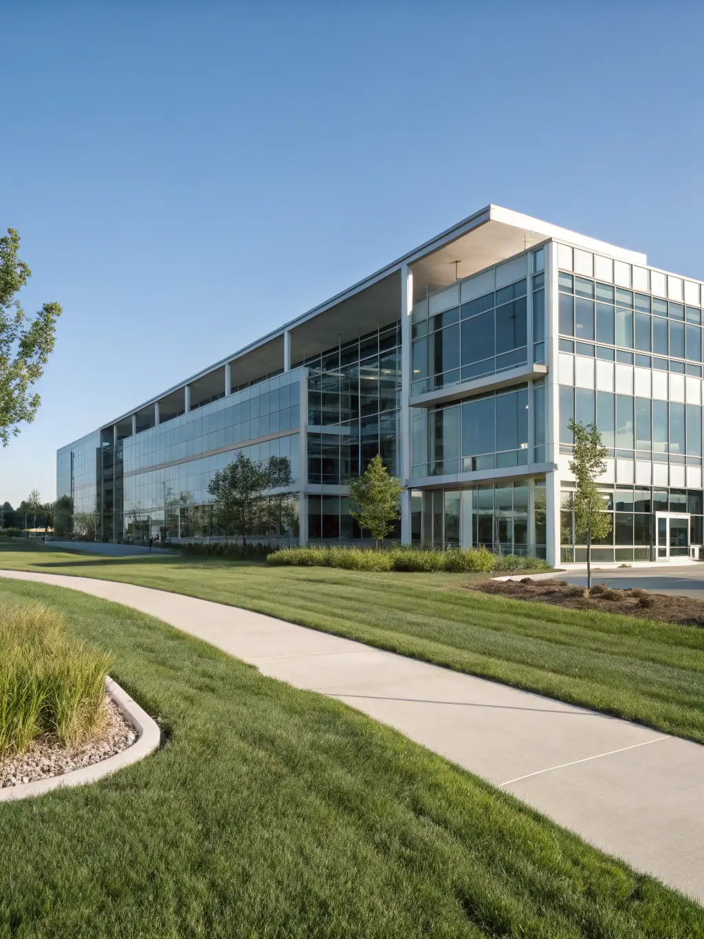 An image of a modern corporate office building, representing IFSA's tailored investment portfolio for corporate clients, focusing on sustainable growth and risk management.